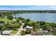 Aerial view of a house near a lake, showcasing its location and surrounding landscape at 1004 Avenue G Ne, Winter Haven, FL 33881