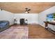Finished basement features a media area, workspace, and comfortable sitting area at 1004 Avenue G Ne, Winter Haven, FL 33881