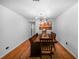 Bright dining room with a rustic wood table and chandelier at 1004 Avenue G Ne, Winter Haven, FL 33881