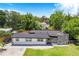 Aerial view of house showcasing the front yard at 1004 Avenue G Ne, Winter Haven, FL 33881
