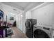 Laundry room with washer and dryer included at 1004 Avenue G Ne, Winter Haven, FL 33881