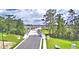 Landscaped pedestrian bridge leading into the neighborhood at 1155 Berry Ln, Davenport, FL 33837