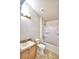 Clean bathroom with tub, shower, granite vanity, and tile floor at 1155 Berry Ln, Davenport, FL 33837