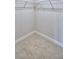 Walk-in closet with wire shelving and carpeted floor at 1155 Berry Ln, Davenport, FL 33837