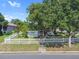 Charming house with a large front yard and white fence at 319 N Wales Dr, Lake Wales, FL 33853