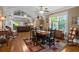 Bright dining room with hardwood floors and view to living room at 319 N Wales Dr, Lake Wales, FL 33853
