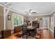 Formal dining room with hardwood floors and fireplace at 319 N Wales Dr, Lake Wales, FL 33853