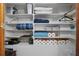 Well-organized storage closet with shelves at 319 N Wales Dr, Lake Wales, FL 33853