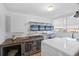 Laundry room with washer, dryer, and ample storage at 319 N Wales Dr, Lake Wales, FL 33853