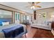 Open studio apartment with a bed, sofa, and small kitchen area at 319 N Wales Dr, Lake Wales, FL 33853
