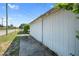 White detached garage with ample storage space at 319 N Wales Dr, Lake Wales, FL 33853