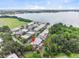 Aerial view showcasing property location near lake and other homes at 2200 Starboard, Winter Haven, FL 33881