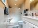 Updated bathroom with a walk-in shower and pebble floor at 4 Casarena Ct, Winter Haven, FL 33881