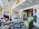 Sunroom with access to kitchen and a view of the backyard at 4 Casarena Ct, Winter Haven, FL 33881