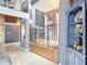 Elegant interior with a split-level design and ornate railing at 4 Casarena Ct, Winter Haven, FL 33881