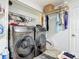 Convenient laundry room with washer, dryer, and storage at 4 Casarena Ct, Winter Haven, FL 33881