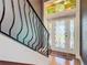 Elegant entryway with stained glass window and ornate front door at 4 Casarena Ct, Winter Haven, FL 33881