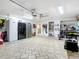 Spacious garage with ample storage and workshop area at 4 Casarena Ct, Winter Haven, FL 33881
