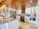 Spacious kitchen featuring modern appliances and wood ceiling at 4 Casarena Ct, Winter Haven, FL 33881