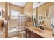 Well-appointed bathroom with tub shower combo and updated vanity at 4496 Strathmore Dr, Lake Wales, FL 33859