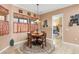 Charming breakfast nook with a round table and built-in seating at 4496 Strathmore Dr, Lake Wales, FL 33859