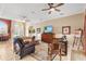 Open living room with hardwood floors and a view to the dining area at 4496 Strathmore Dr, Lake Wales, FL 33859