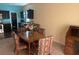 Casual dining area with a round table and chairs, adjacent to the kitchen at 4850 St James Ct, Winter Haven, FL 33881