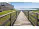 Wooden boardwalk leading to a lake view at 339 Lake Smart Cir, Winter Haven, FL 33881