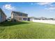 Spacious backyard with grassy lawn and privacy fence at 339 Lake Smart Cir, Winter Haven, FL 33881