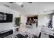 Open kitchen with island, stainless steel appliances, and granite countertops at 339 Lake Smart Cir, Winter Haven, FL 33881