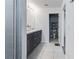 Modern bathroom with double vanity and walk-in shower at 339 Lake Smart Cir, Winter Haven, FL 33881