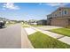 Quiet street with houses and driveways at 339 Lake Smart Cir, Winter Haven, FL 33881