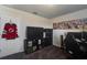 Cozy bedroom featuring a media console and gaming chair at 339 Lake Smart Cir, Winter Haven, FL 33881