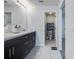 Modern bathroom with double vanity and walk-in shower at 339 Lake Smart Cir, Winter Haven, FL 33881