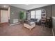 Relaxing sitting area with comfy couch and built-in shelving at 339 Lake Smart Cir, Winter Haven, FL 33881
