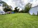 Spacious property with large yard, mobile home, and outbuildings at 2010 Ridge Meadow Dr, Lakeland, FL 33809