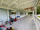 Large covered porch with plenty of space for relaxing at 2010 Ridge Meadow Dr, Lakeland, FL 33809