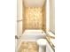 Clean bathroom with a bathtub, toilet and tile surround at 506 Tanaro Ln, Haines City, FL 33844