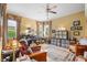 Home office with ample desk space, comfortable seating, and built-in shelving at 4496 Strathmore Dr, Lake Wales, FL 33859
