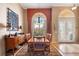 Bright dining room with a large window and hardwood floors at 4496 Strathmore Dr, Lake Wales, FL 33859