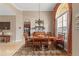 Formal dining room with a wooden table and large window at 4496 Strathmore Dr, Lake Wales, FL 33859