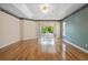 Main bedroom with hardwood floors and sliding glass doors to a patio at 324 Lake Mariam Blvd, Winter Haven, FL 33884