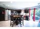 Eat-in kitchen with stainless steel appliances and access to the backyard patio at 997 Pearly Ridge Ln, Lakeland, FL 33809