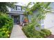 Walkway to the front door with landscaping at 997 Pearly Ridge Ln, Lakeland, FL 33809