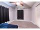 Simple bedroom with carpeted floors and neutral walls at 997 Pearly Ridge Ln, Lakeland, FL 33809