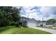 Two-story house with attached garage and front yard at 997 Pearly Ridge Ln, Lakeland, FL 33809