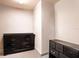 Small bedroom with two dressers and carpeted floors at 997 Pearly Ridge Ln, Lakeland, FL 33809