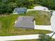 Aerial view of a house with a large backyard at 1439 Sarasota Dr, Kissimmee, FL 34759