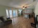 Eat-in kitchen with butcher block island and access to backyard at 6750 Winterset Gardens Rd, Winter Haven, FL 33884