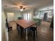Eat-in kitchen with butcher block island and view to backyard at 6750 Winterset Gardens Rd, Winter Haven, FL 33884